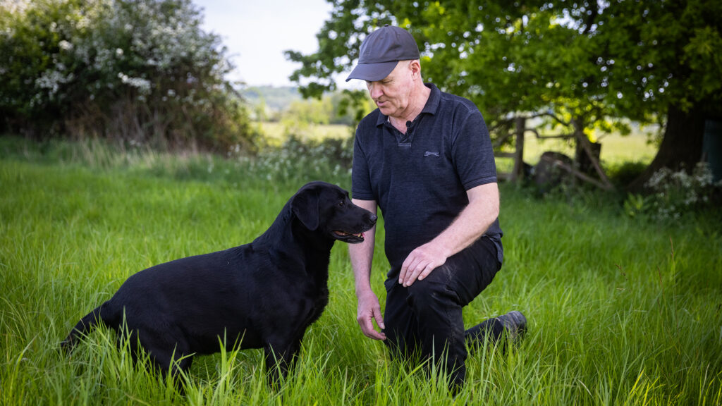 A farmer and his dog