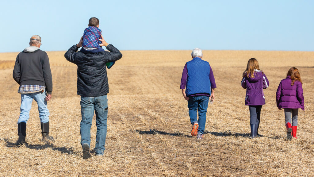 A family walking into the distance