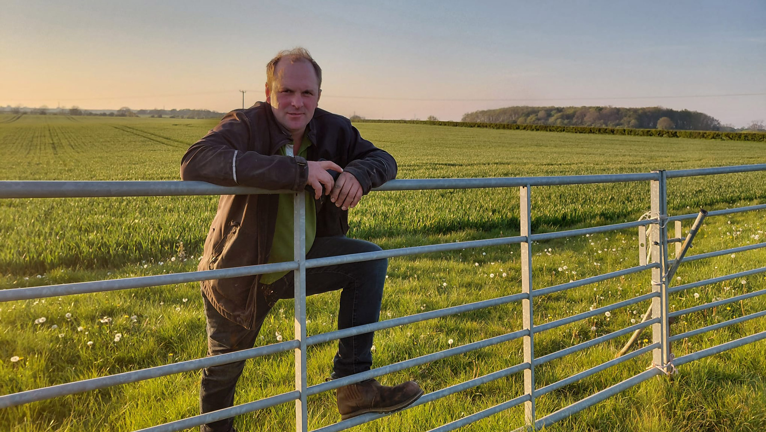 Grant Page by farm fence
