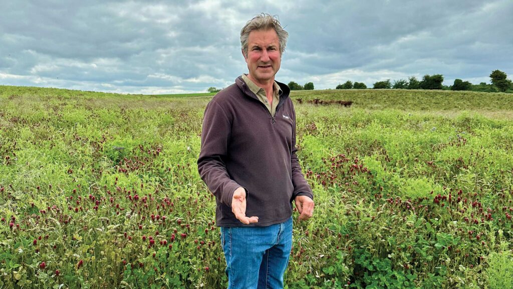 James Bucher standing in field