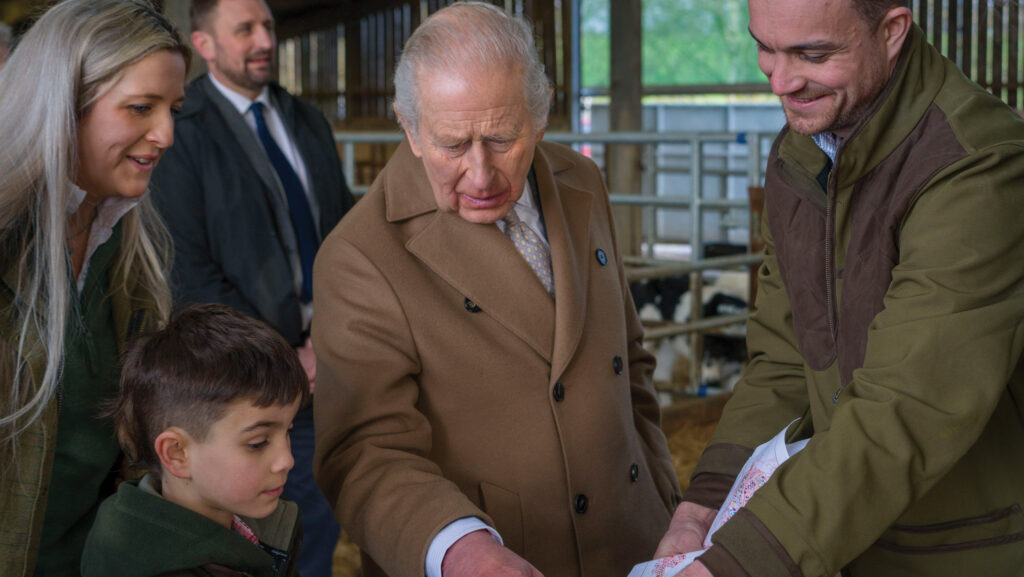 King Charles with Joe Towers, Hannah Kent and their son, George © Duchy of Lancaster