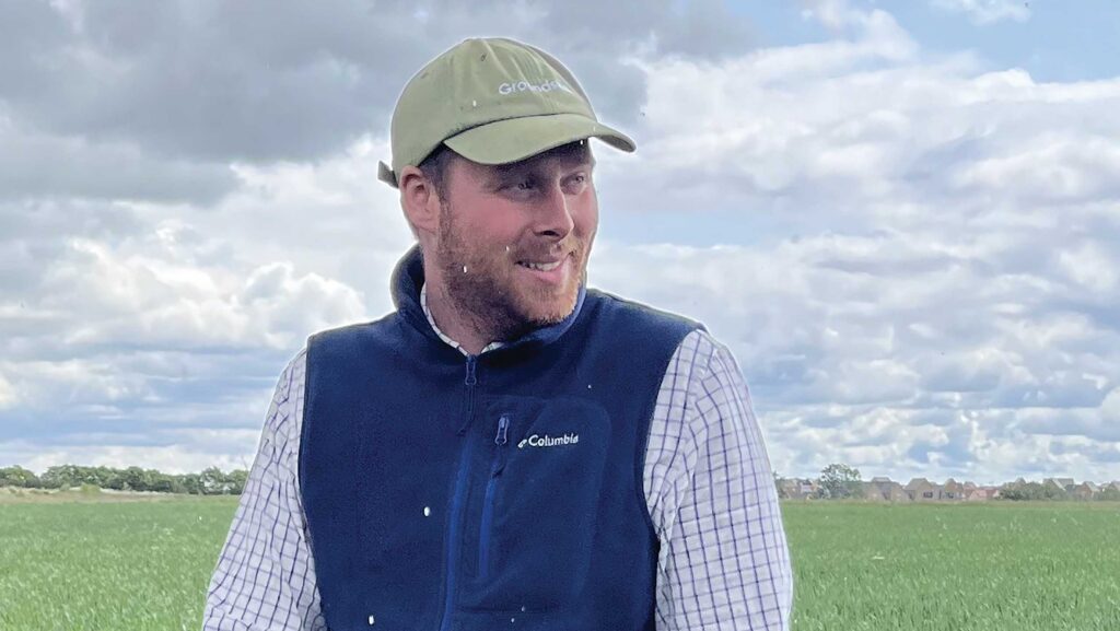 Rhys Jones standing in field