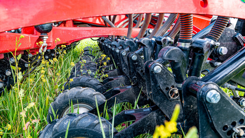 Close-up of drill wheels in cover crop
