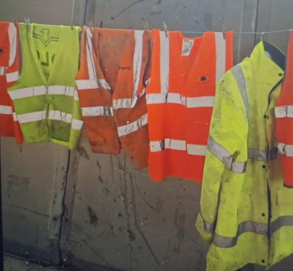Some of the hi-vis jackets hanging up