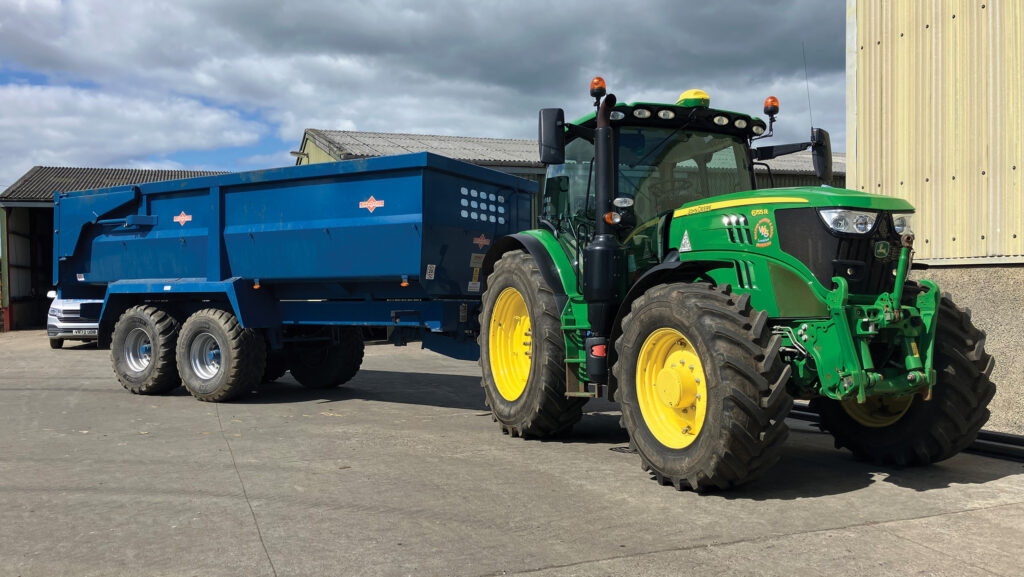 Tractor and trailer on yard