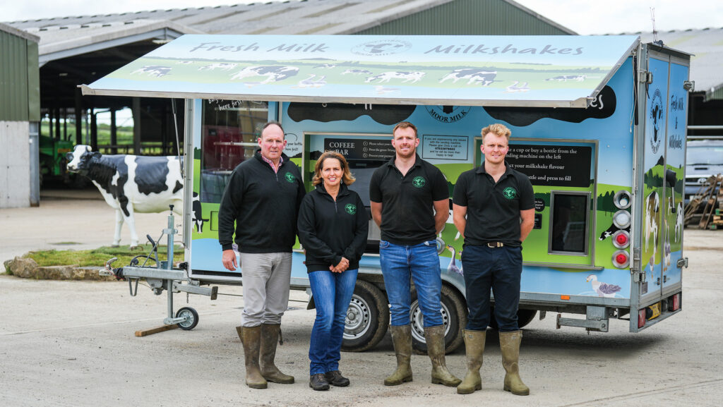 Julian Courtier (left) with his wife Mary and sons Christopher and George © Emily Fleur