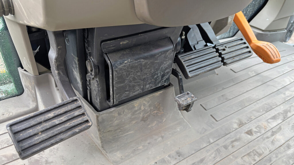 Redesigned pedals in tractor cab