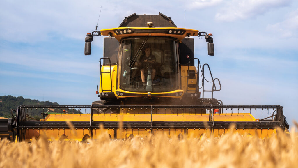 A New Holland combine harvesting wheat at Whittal-Williams Farms, Abergavenny