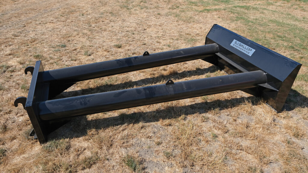 Twin-tube grain pusher