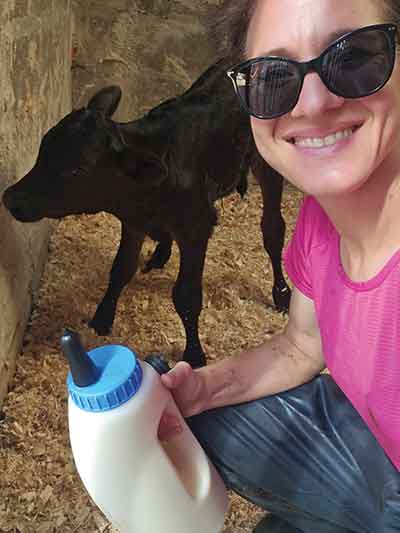 Holly Atkinson with calf