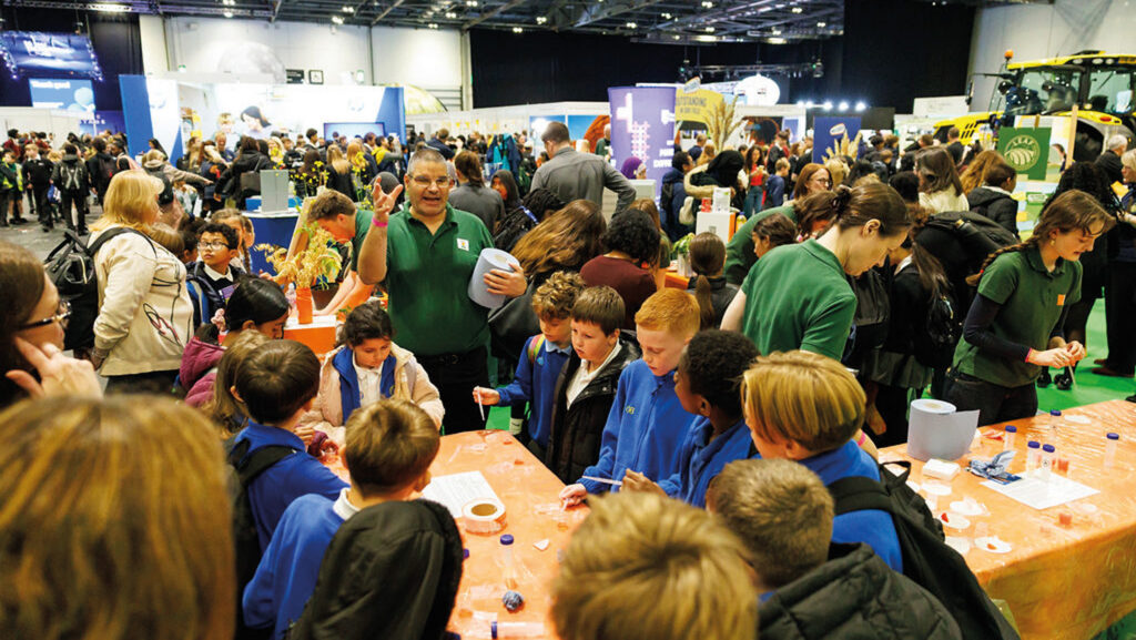 Schoolchildren learn about cereals on the KWS stand at New Scientist Live