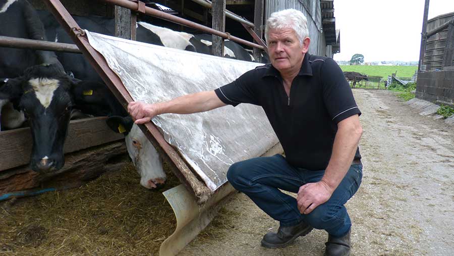 Frank Morphet demonstrates his feed cover