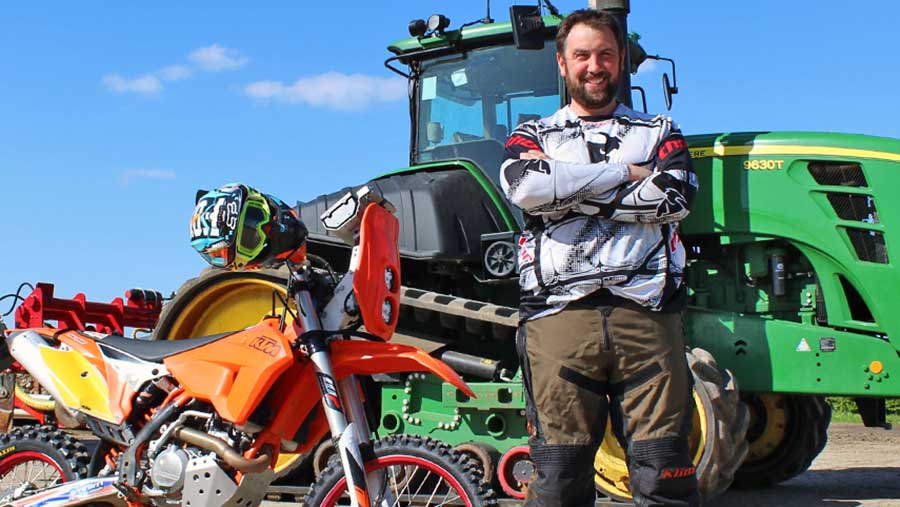 John Haynes with KTM motorbike and John Deere tractor © Oli Hill/RBI