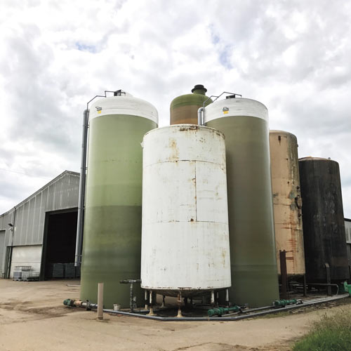 Liquid feed storage tanks