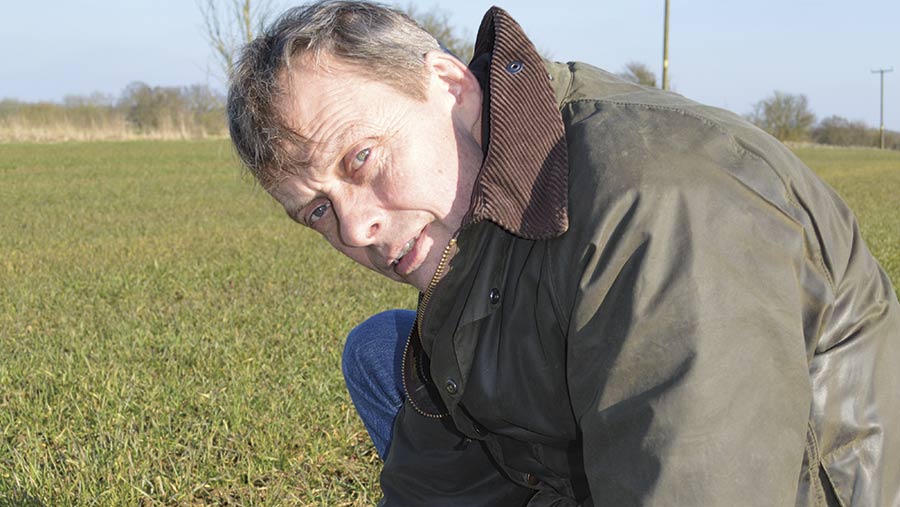 Andrew Cook in a field