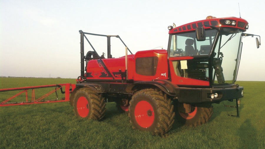 A Sands Vision sprayer works in a field