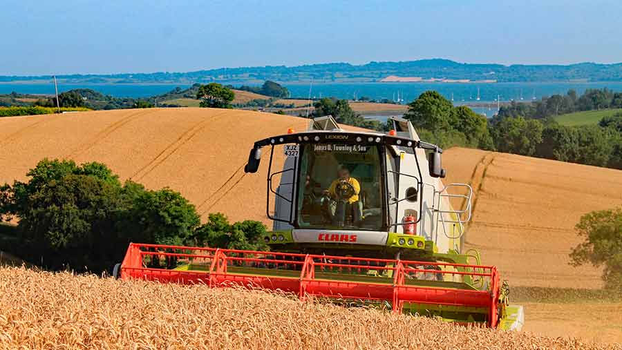 Trevor Thompson of JD Townley & Son harvesting wheat in Killyleagh, Northern Ireland. Photo by FWi user Agriview.