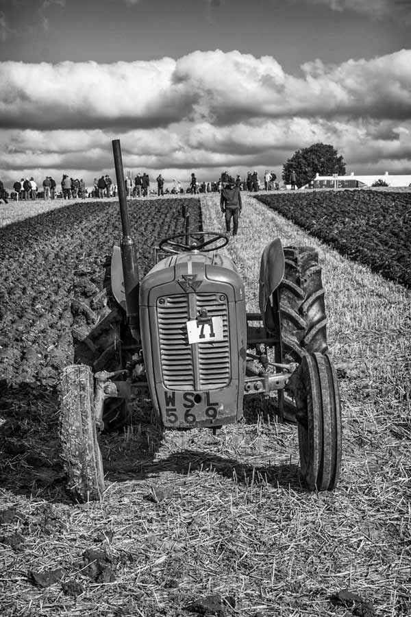 Old tractor ploughing