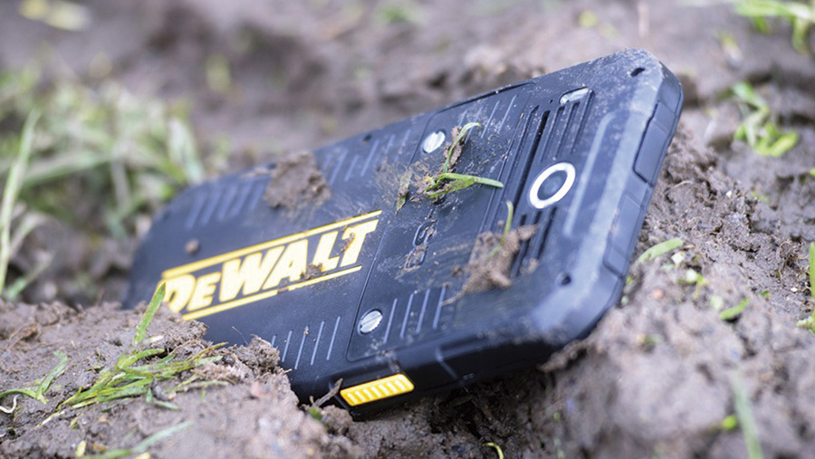 Dewalt rugged smartphone in mud