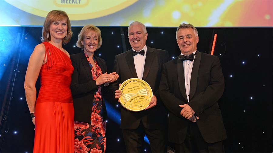 Nathan Dellicott receives his award from Andrea Leadsom with FW's Karl Schneider and Fiona Bruce