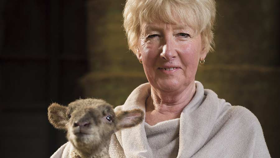 Bobbi Mothersdale with a lamb