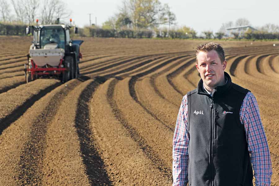 Matt-Alford in a potato field with a tractor