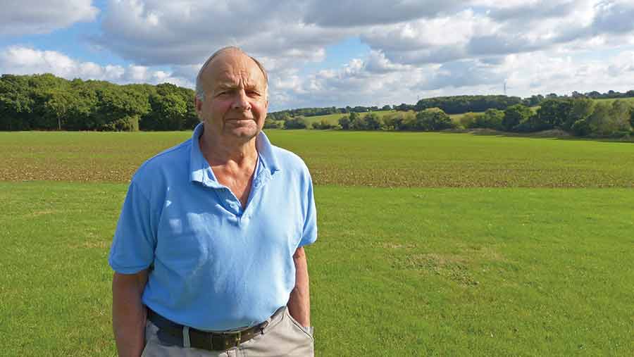 Peter Headley standing in a field