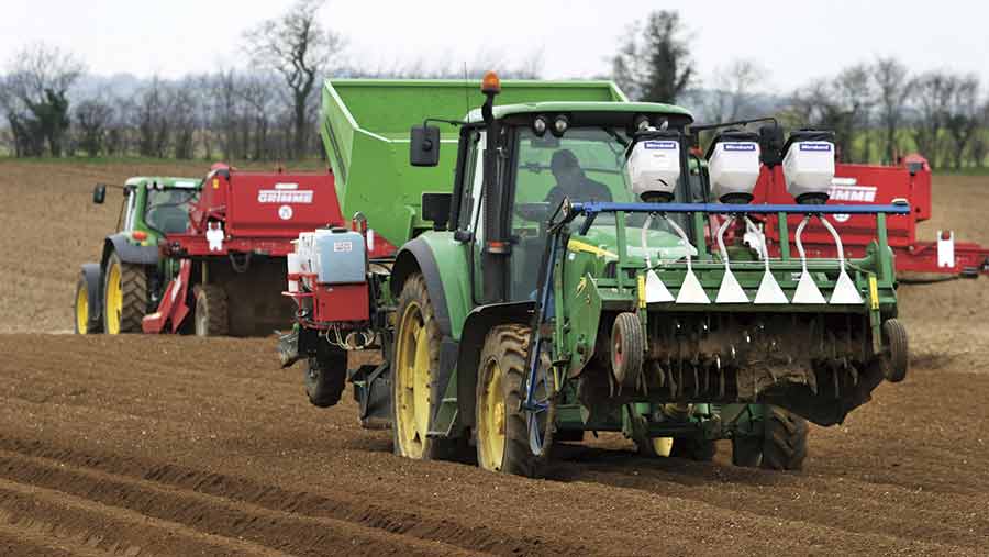 Russell-Farms-planting-potatoes