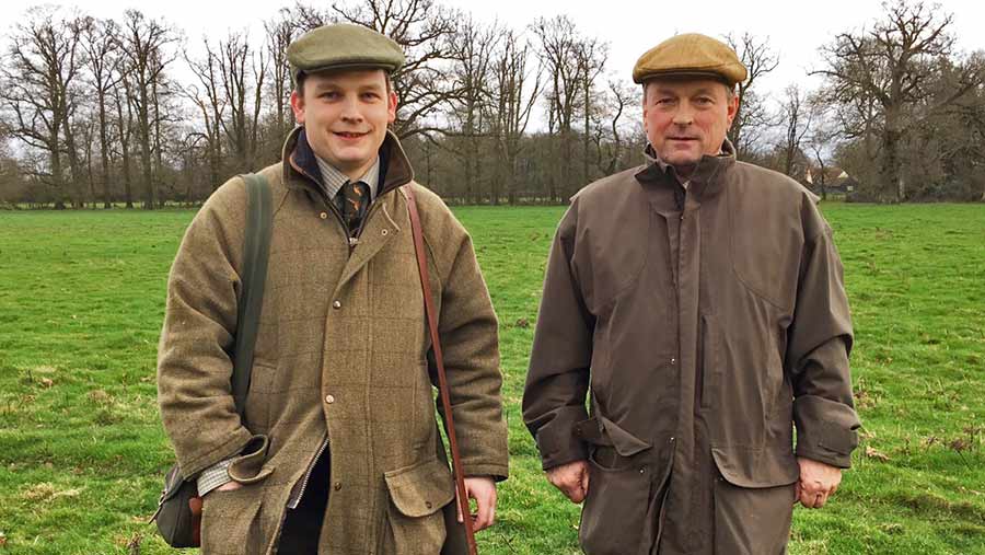 Will Sargent and his father stand in a field