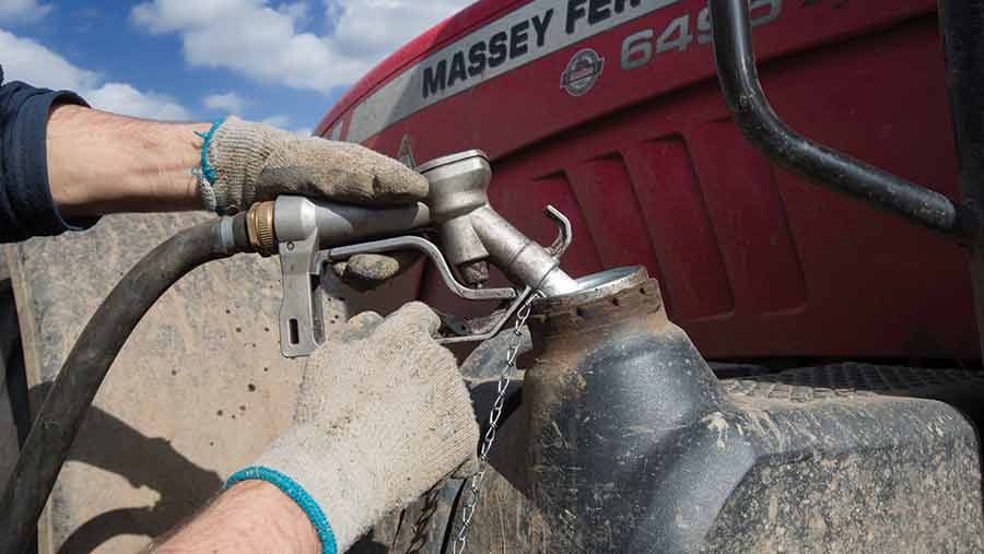 filling diesel in tractor