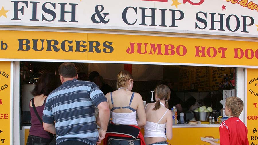 Queing and fish and chip stall © Jonathan Player/REX/Shutterstock