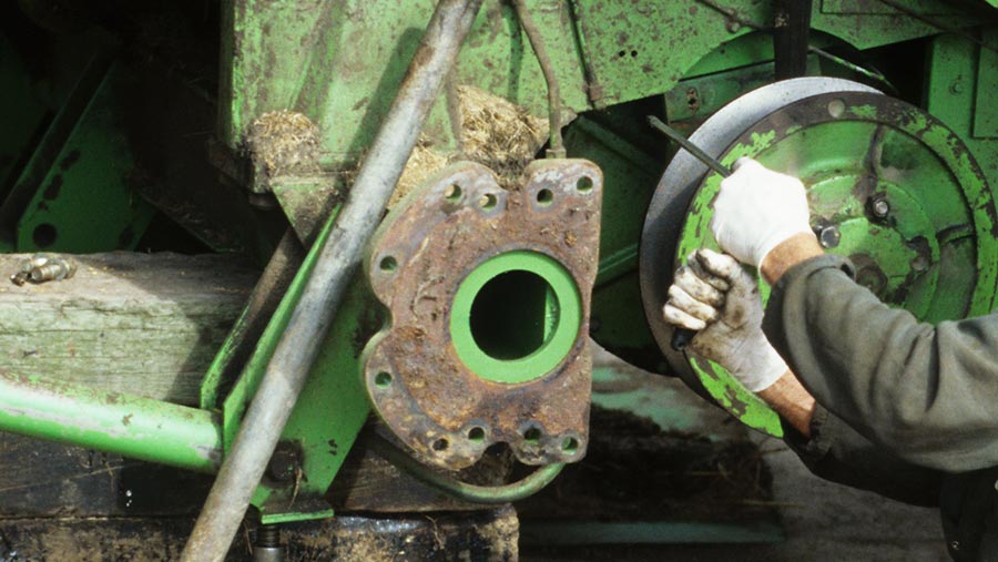 fixing a combine © FLPA/REX/Shutterstock