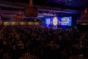 View of tables and the stage at Farmers Weekly Awards 2023