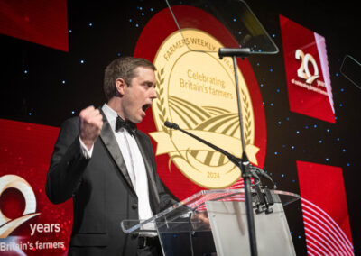 Farmers Weekly editor Andrew Meredith at the podium at the Farmers Weekly Awards