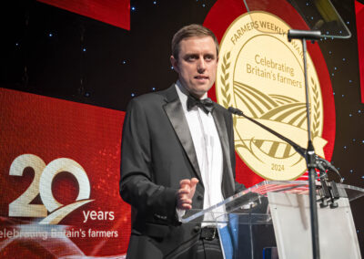 Farmers Weekly editor Andrew Meredith at the podium at the Farmers Weekly Awards