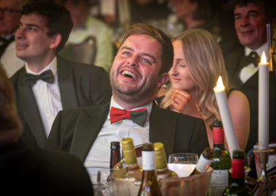 Guest at the Farmers Weekly Awards laughing in the audience