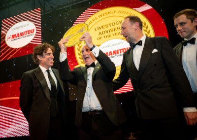 Award winners holding their award at the Farmers Weekly Awards