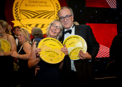 Award winners holding their award at the Farmers Weekly Awards