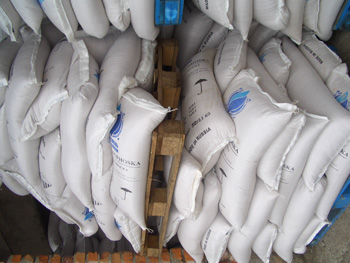 Russian-made fertiliser is hand-stacked onto palle